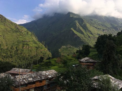 Remote Himalayan village in Uttarakhand showcasing traditional wooden homes